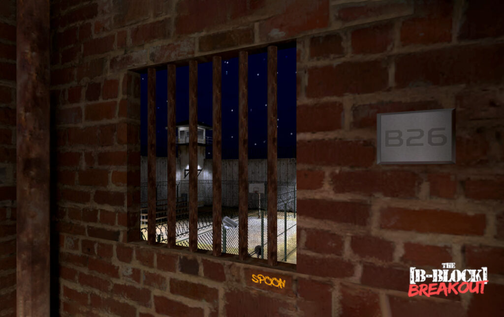 a brick wall with bars in it